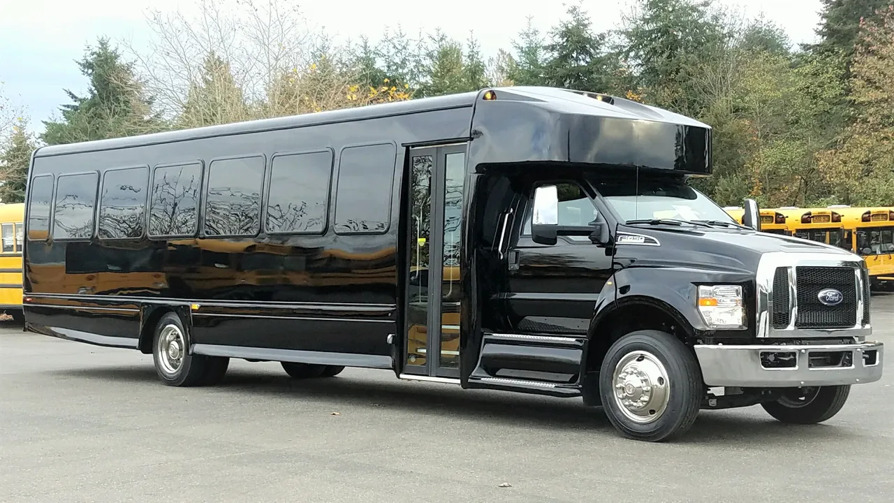 Black Ford F650 Executive VIP Shuttle Bus (44 Passenger), photo 2 for charter bus rental Black Ford F650 Executive VIP Shuttle Bus (44 Passenger), photo 2 for charter bus rental