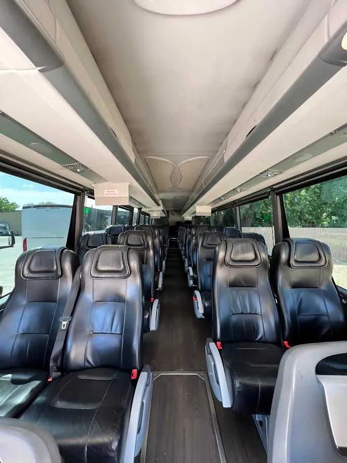 White MCI Motorcoach, photo 2 for charter bus rental White MCI Motorcoach, photo 2 for charter bus rental